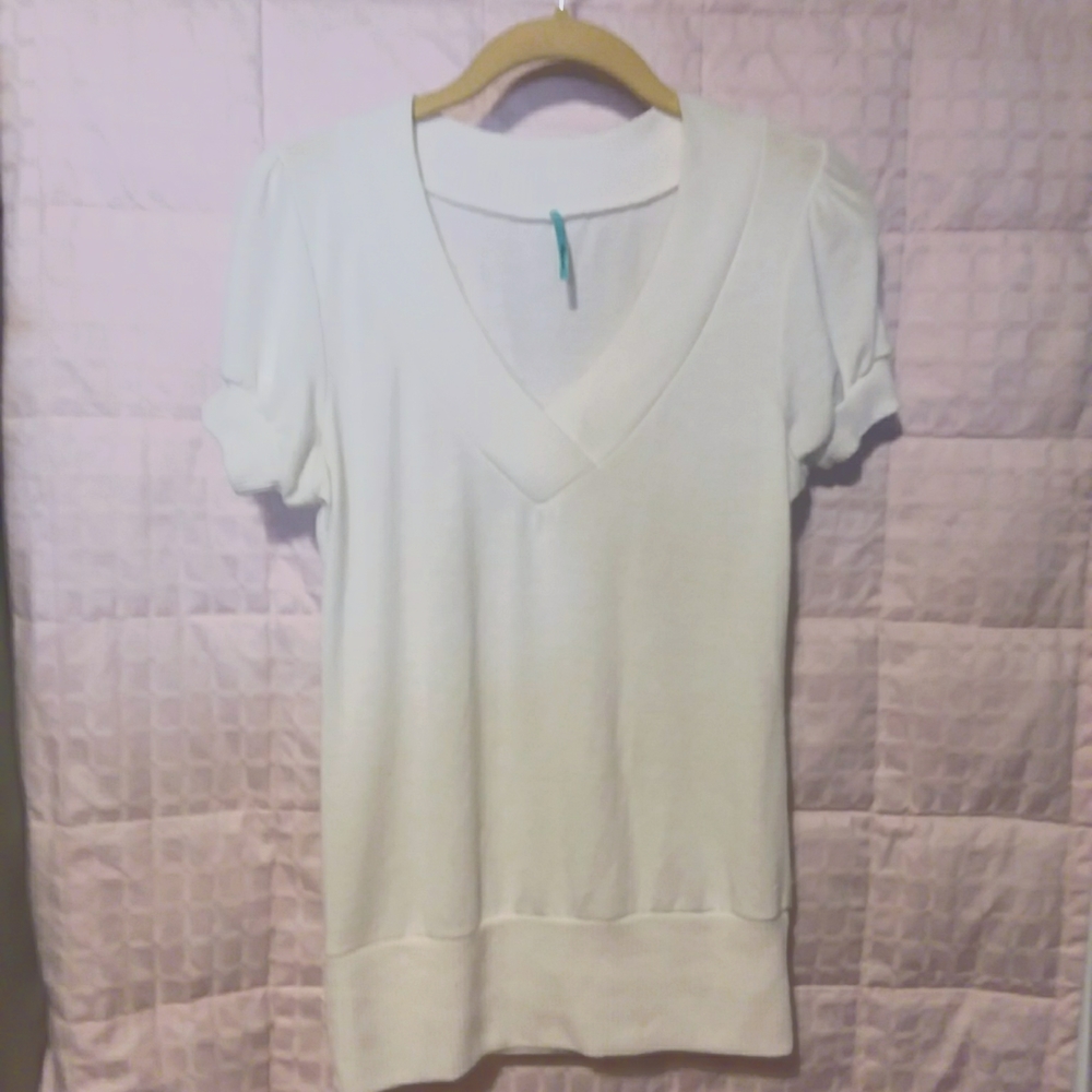 RHAPSODIELLE sweater top in white.  Label says large but looks smaller.